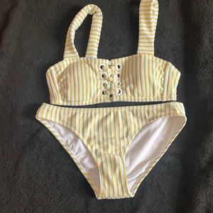Xhiliration bikini new without tags size medium lace up front stripe